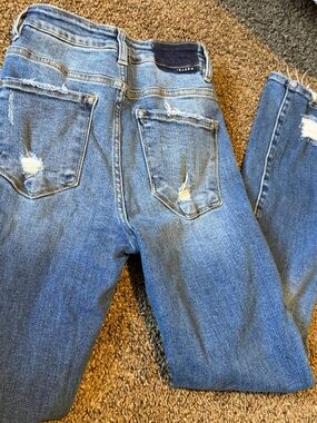 Risen mid rise Straight Leg Women’s Jeans in Medium Blue